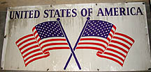 one%20large%20steel%20tile%20with%20two%20United%20States%20flags%20crossed%20and%20%22UNITED%20STATES%20OF%20AMERICA%22%20across%20the%20top%20marking%20the%20border%20in%20the%20Windsor-Detroit%20tunnel
